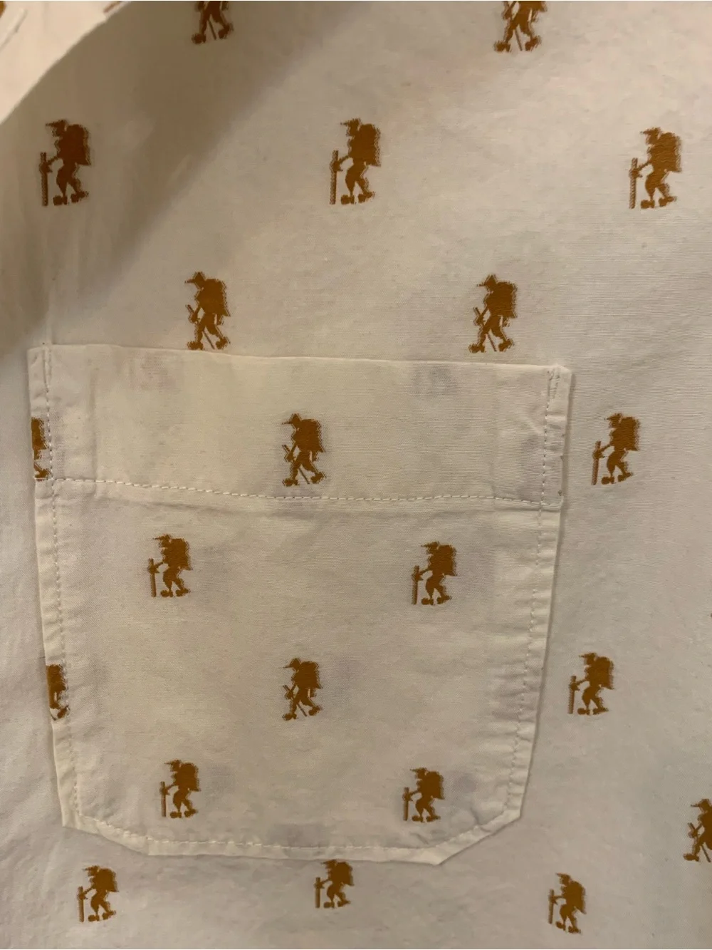 The North Face Beige Short-Sleeve Button-Down Shirt with Brown Hiker Print